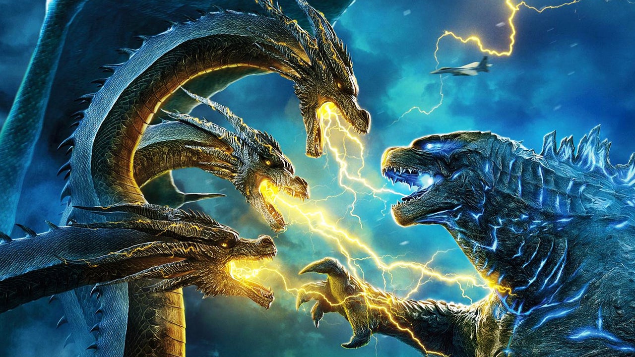 A screenshot of a promotional image for Godzilla: King of the Monsters showing the titular character fighting King Ghidorah