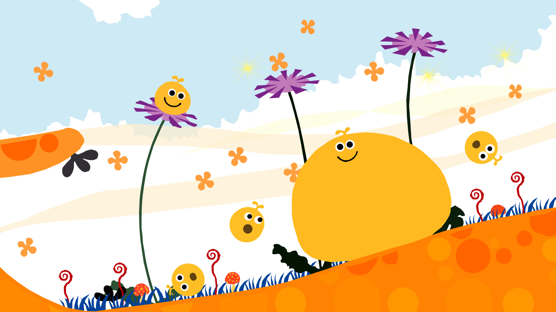 best PSP games: a large yellow blob and three small yellow blobs in a orange landscape with grass and flowers